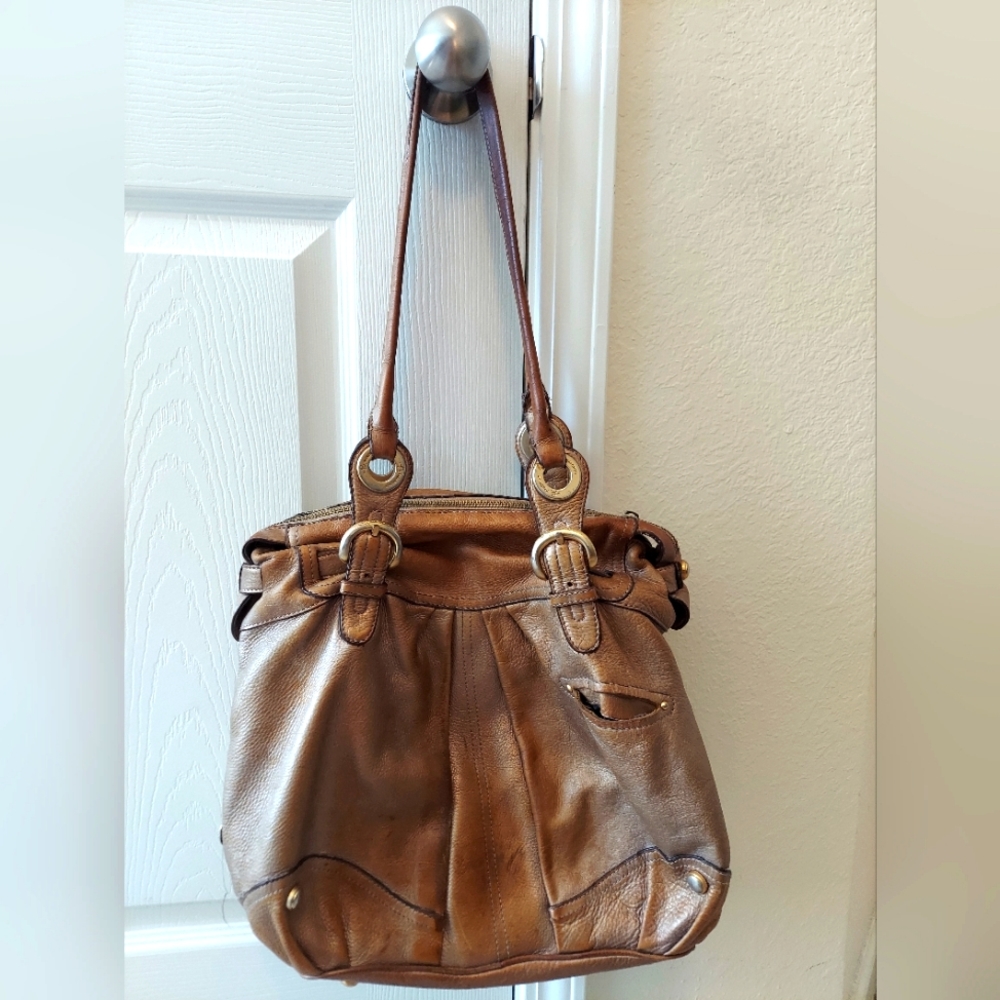 B. Makowsky Metalic purse